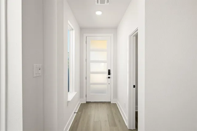 a view of kitchen and kitchen with sink