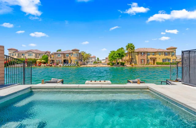 a patio with table and chairs