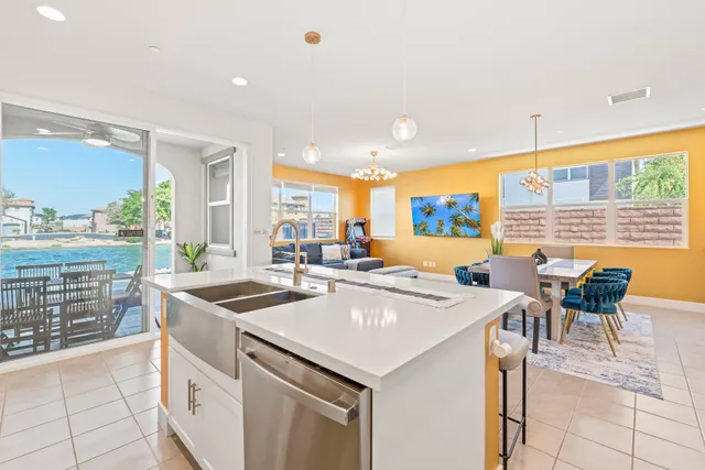 a spacious bathroom with a shower sink and mirror