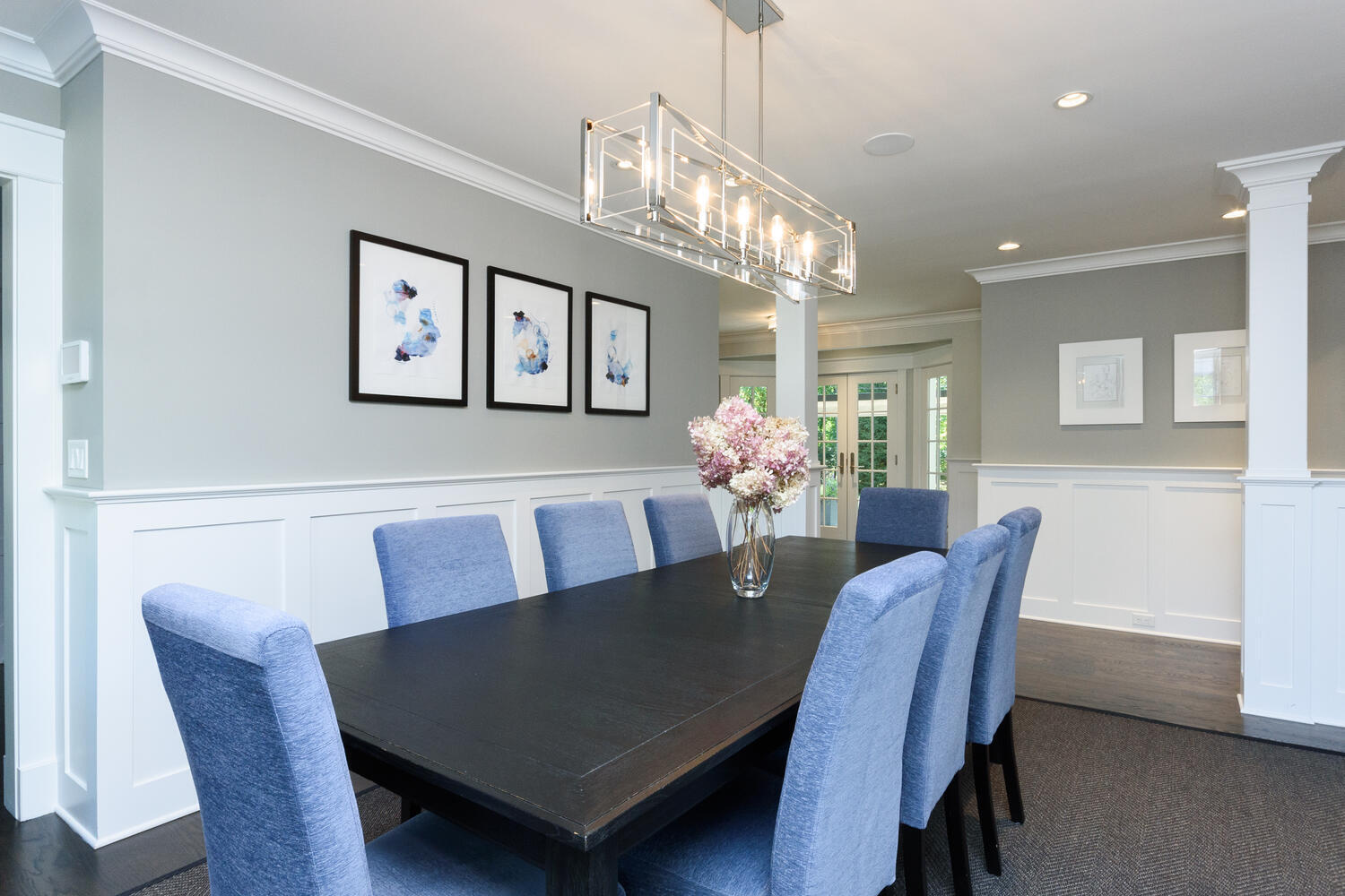 293 Hollow Tree Ridge Road Darien, CT 06820 - Photo 11 of 46 a view of a dining room with furniture and chandelier
