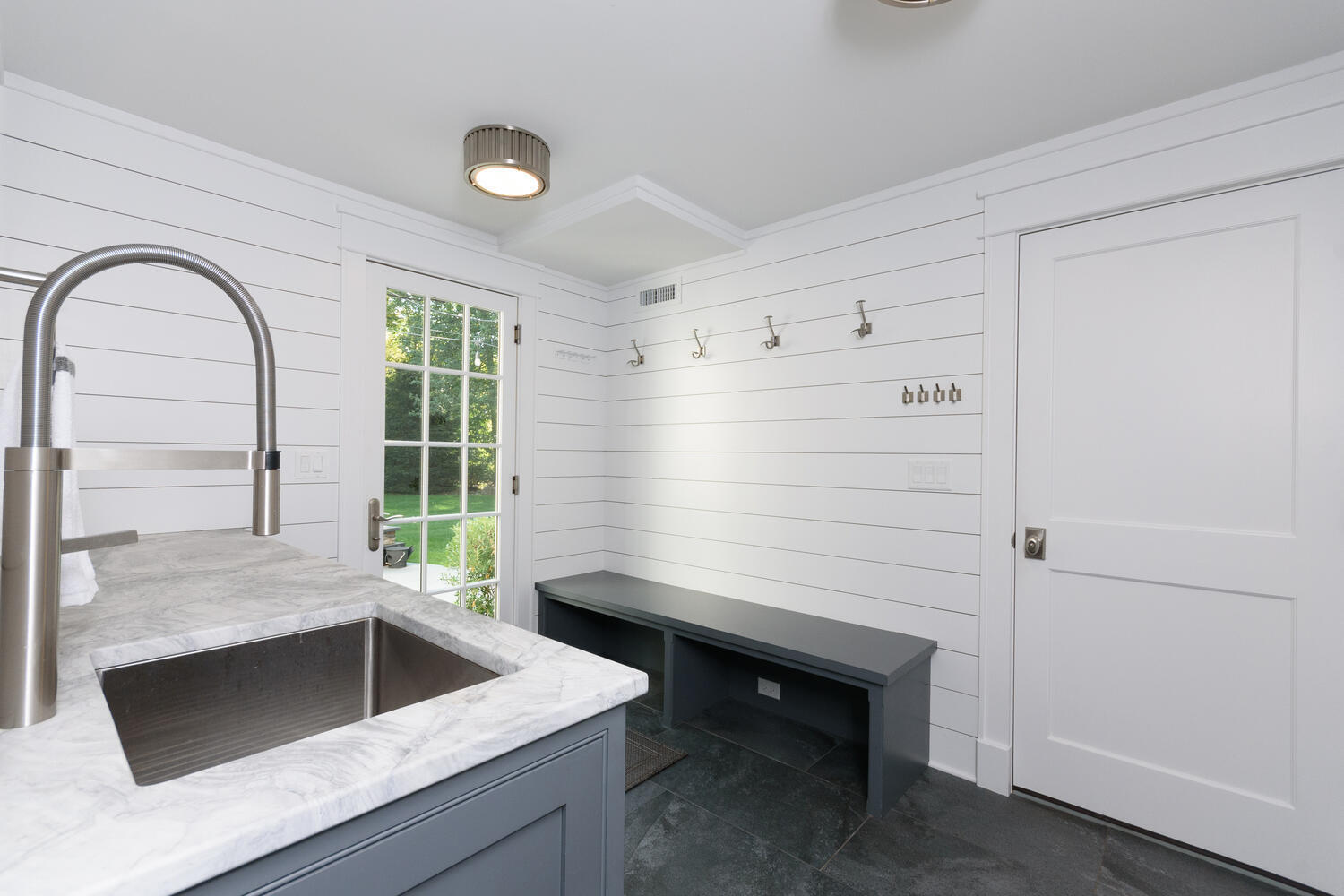 293 Hollow Tree Ridge Road Darien, CT 06820 - Photo 16 of 46 a kitchen with a sink and a window