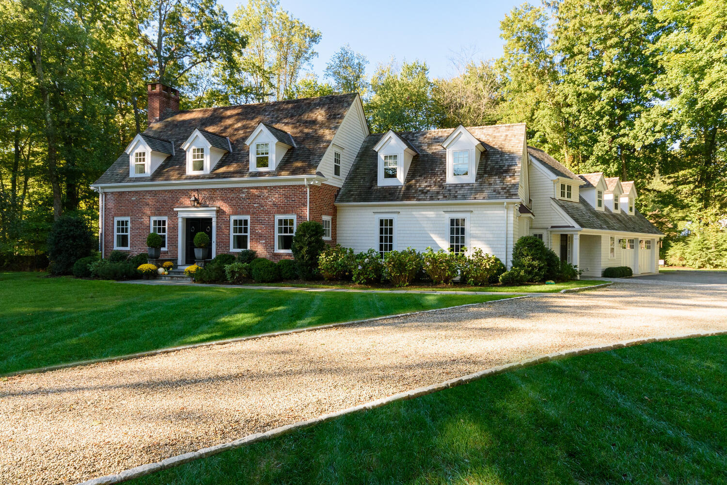 293 Hollow Tree Ridge Road Darien, CT 06820 - Photo 3 of 46 front view of house with a yard