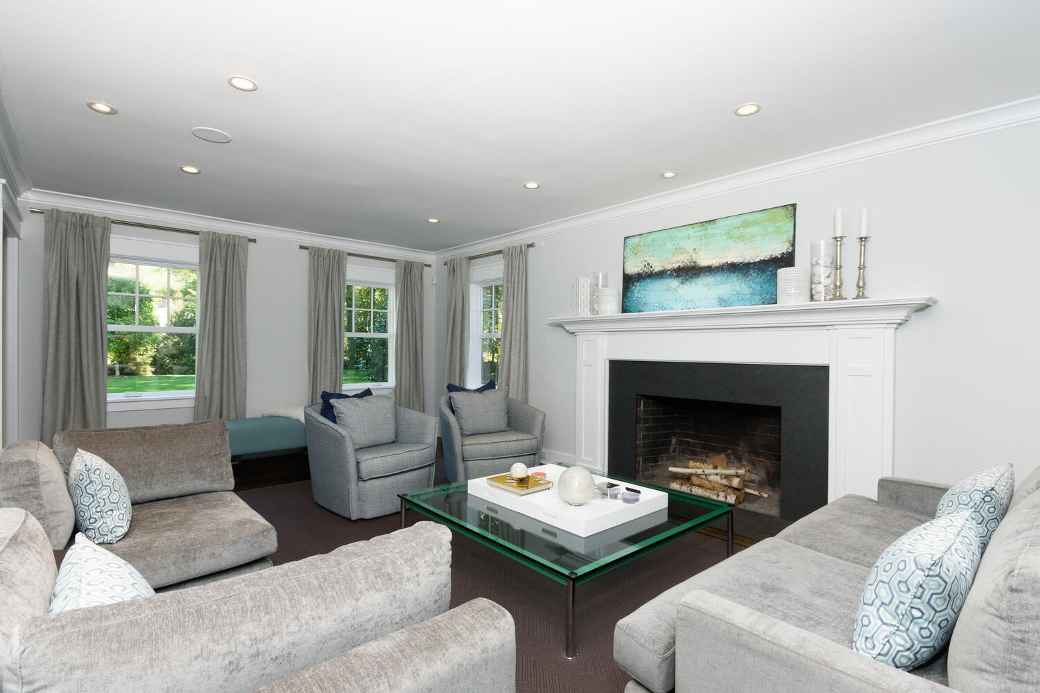 293 Hollow Tree Ridge Road Darien, CT 06820 - Photo 7 of 46 a living room with furniture and a fireplace