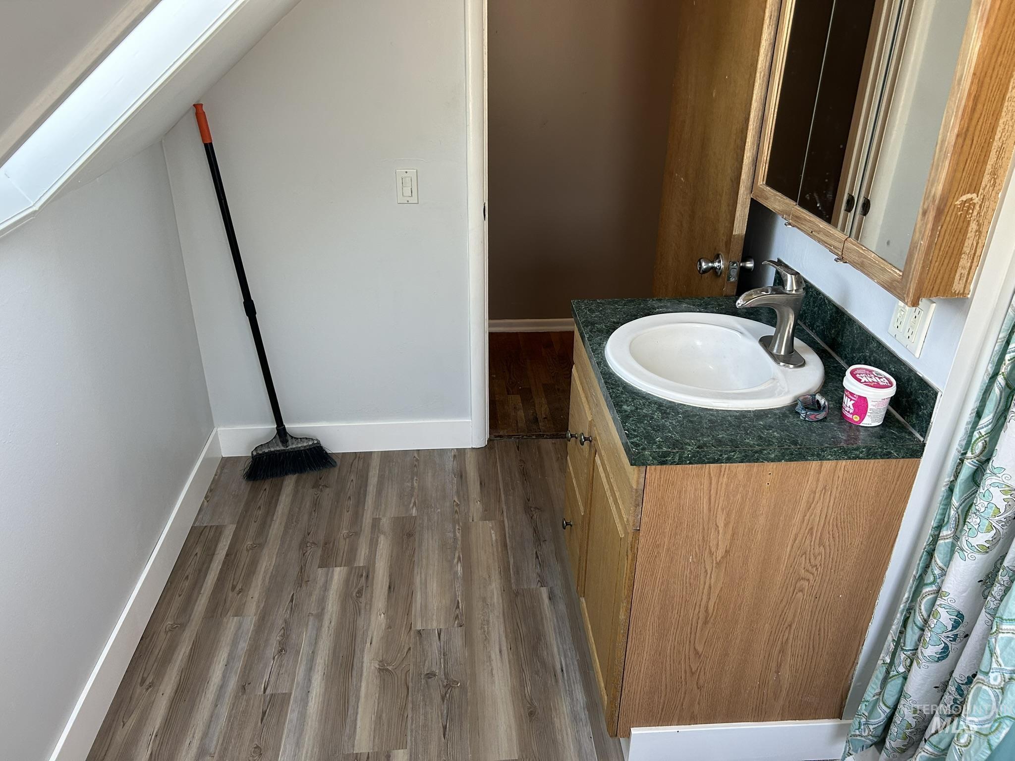 3837 16th Street Lewiston, ID 83501 - Photo 14 of 42 Bathroom featuring light wood finished floors and vanity