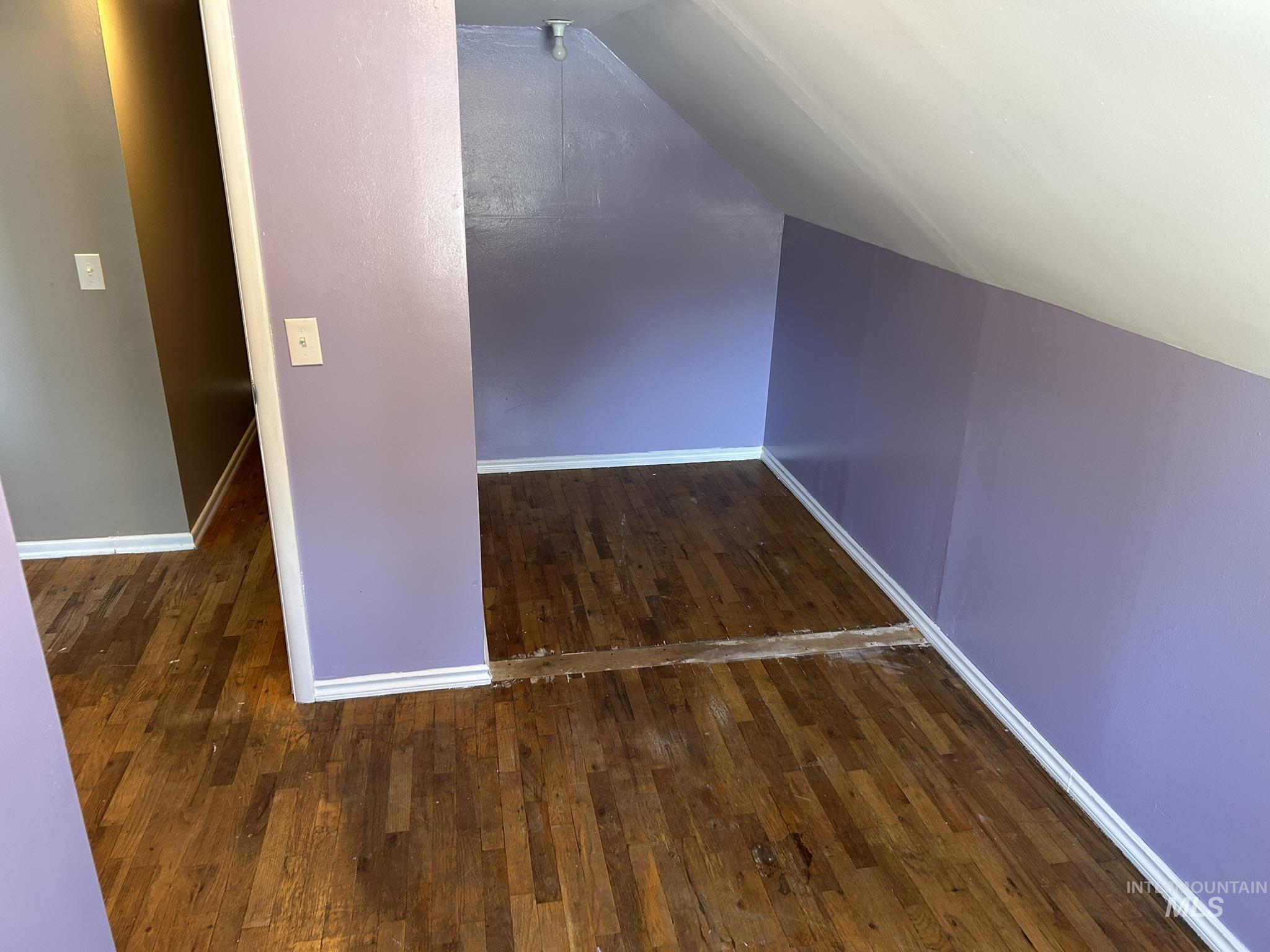 3837 16th Street Lewiston, ID 83501 - Photo 16 of 42 Bonus room featuring dark wood finished floors and lofted ceiling