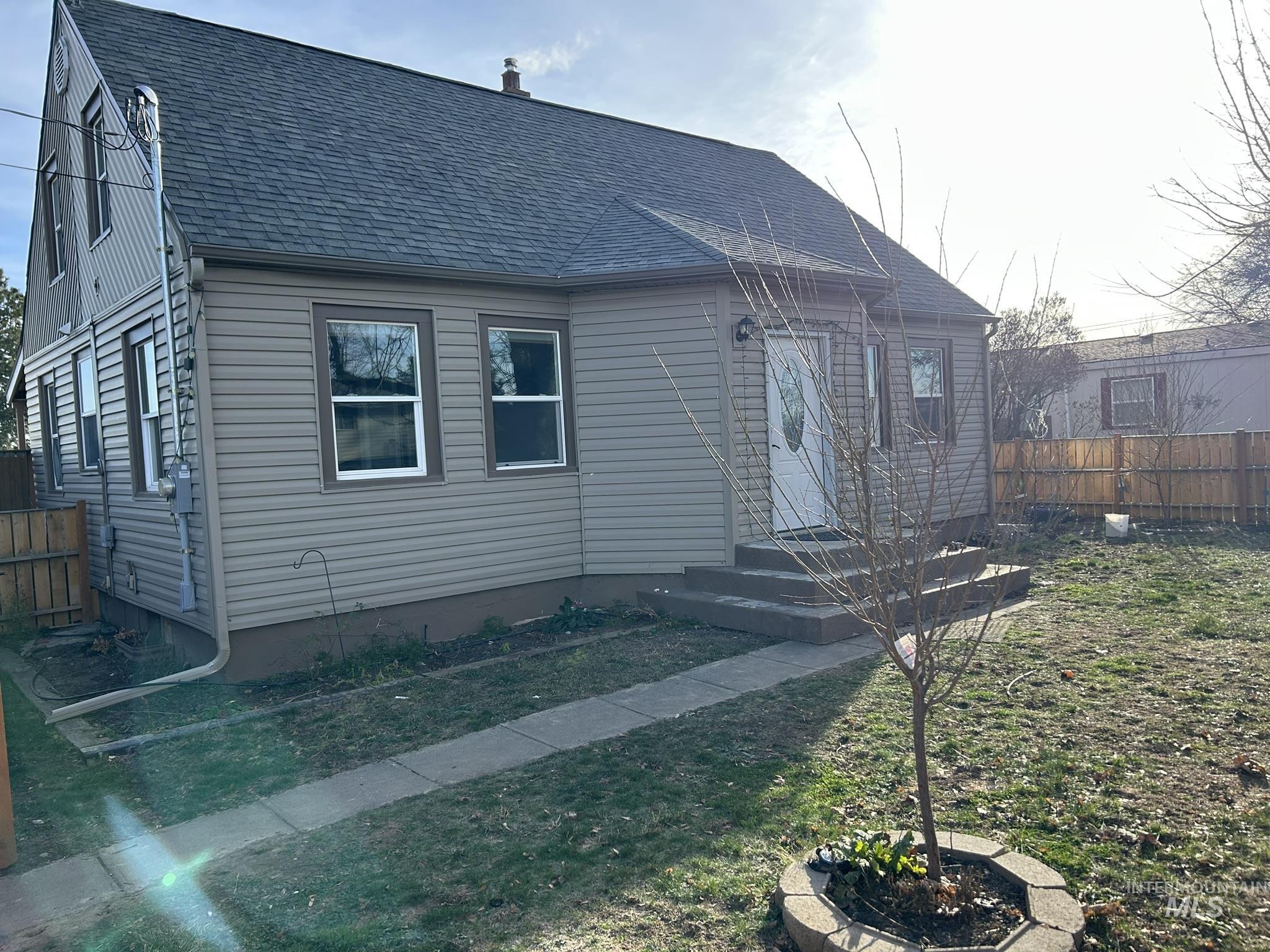 3837 16th Street Lewiston, ID 83501 - Photo 2 of 42 View of front of house featuring roof with shingles