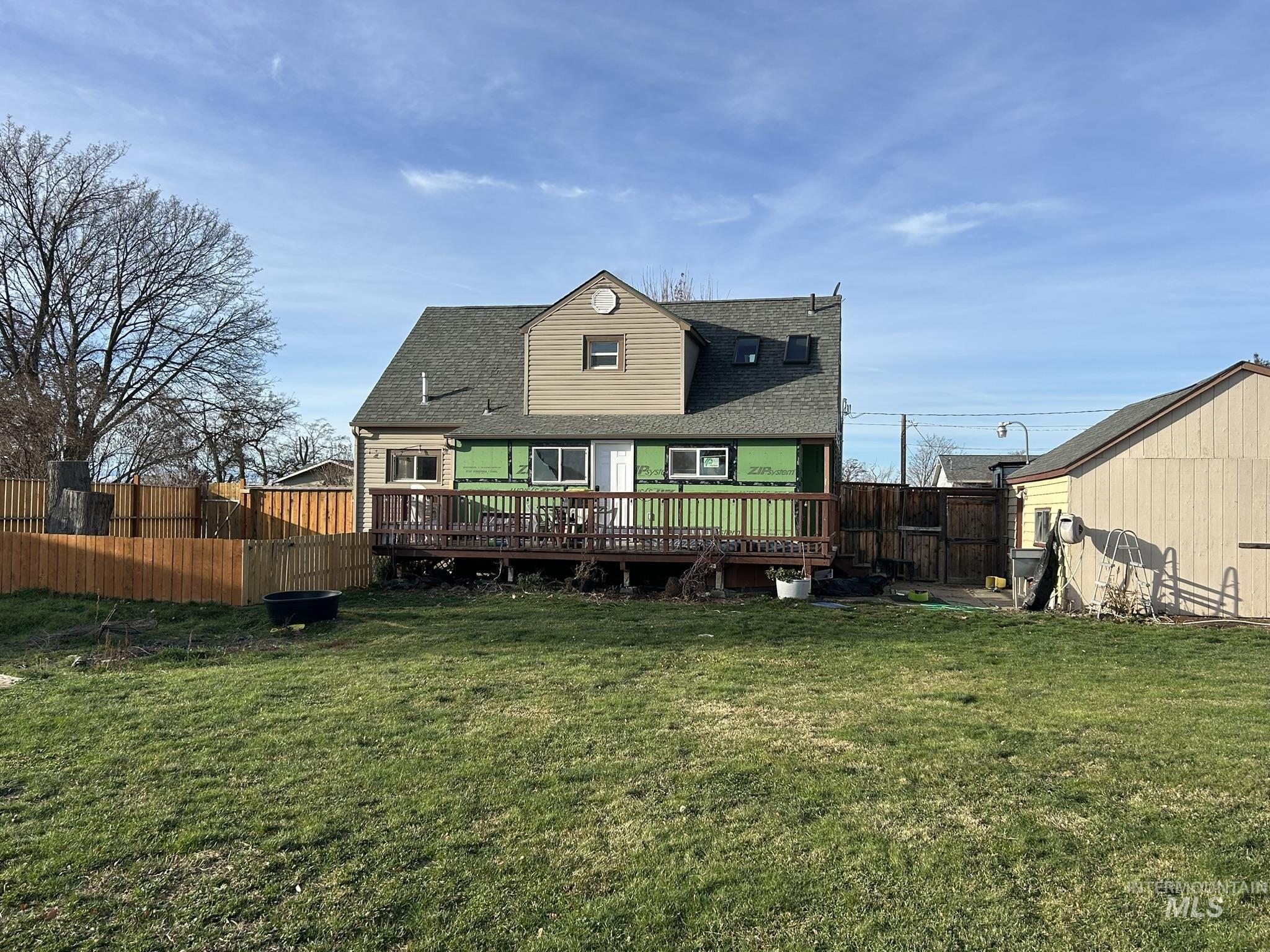 3837 16th Street Lewiston, ID 83501 - Photo 38 of 45 Back of property with a deck and a shingled roof