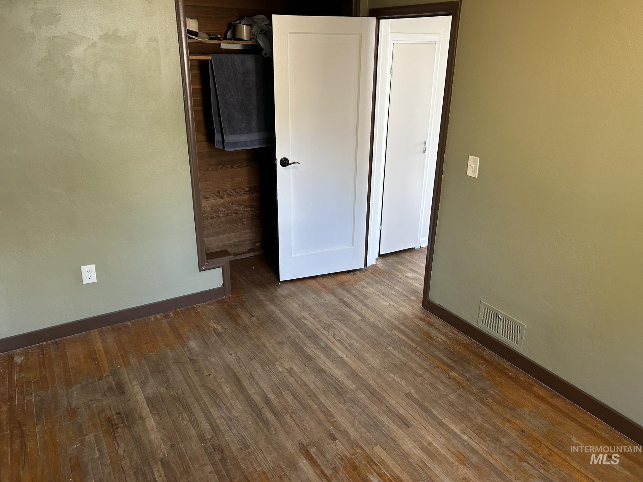 3837 16th Street Lewiston, ID 83501 - Photo 8 of 42 Spare room featuring dark wood-type flooring