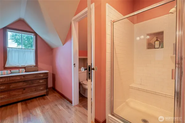 a view of bathroom with a washer and dryer