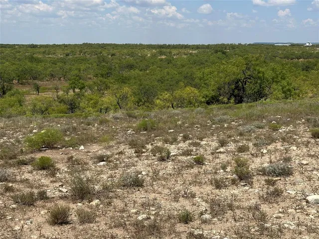 a view of a lake with beach