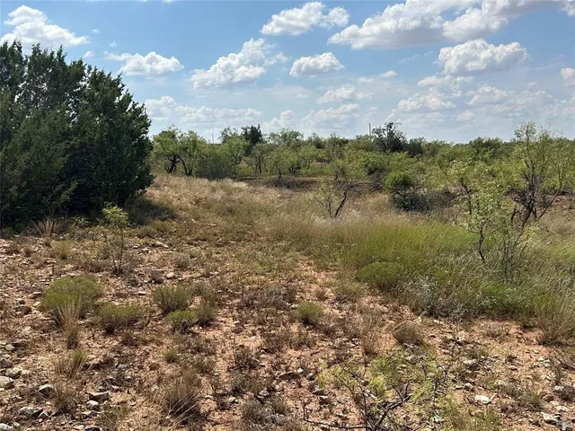 a view of an outdoor space with a lake view