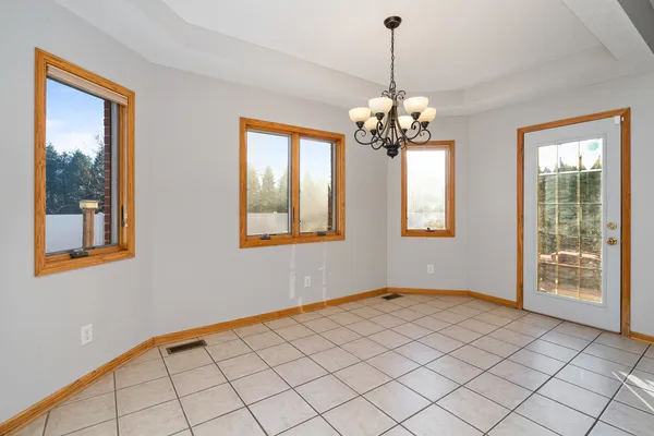 a living room with furniture flat screen tv and a fireplace