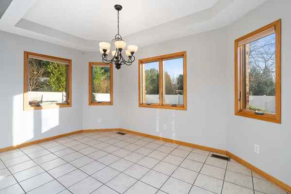 a living room with furniture flat screen tv and a fireplace