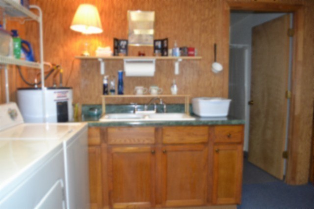 318 Rock Springs Road Celina, TN 38551 - Photo 32 of 87 a bathroom with a sink and a mirror