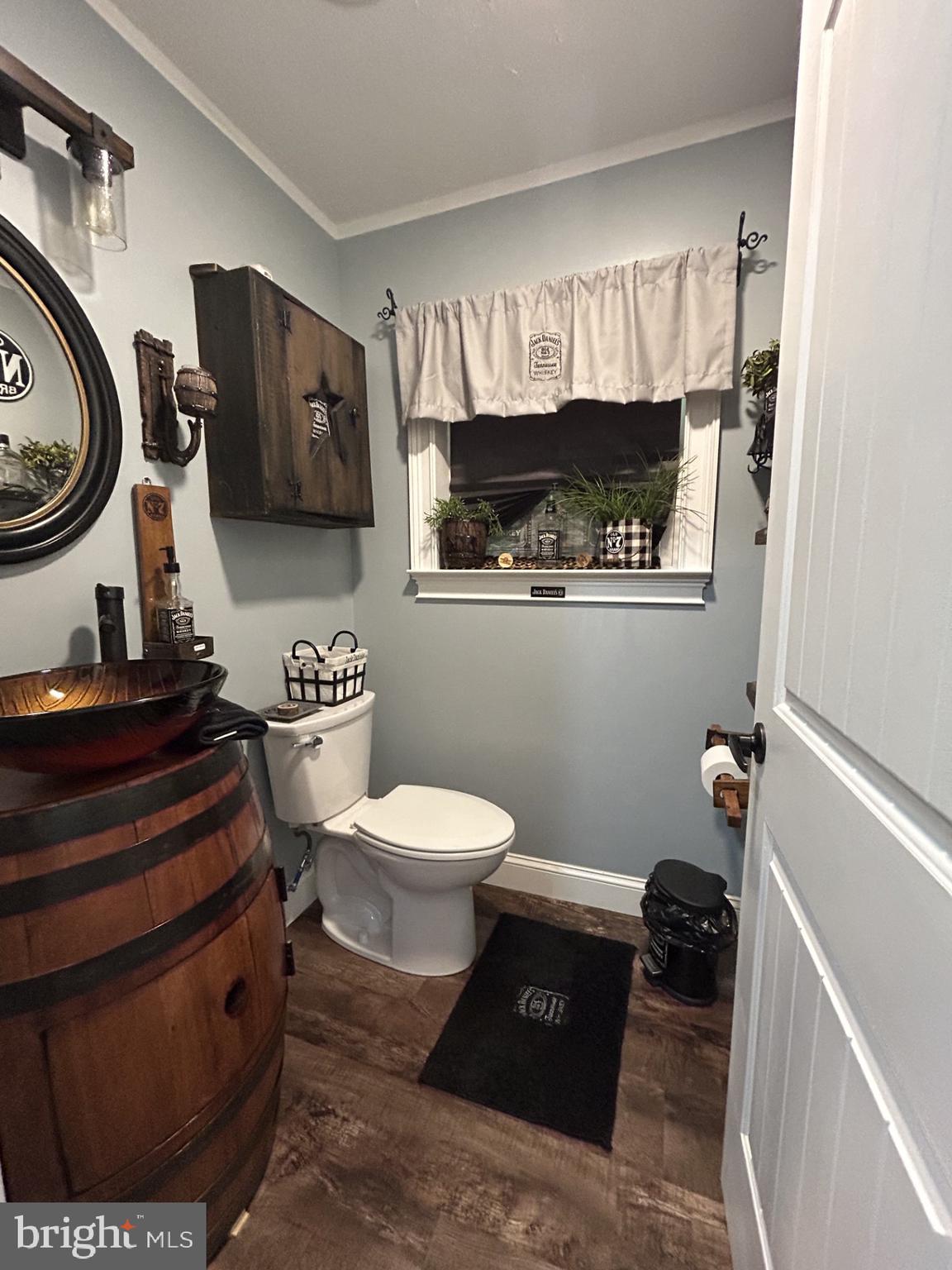 14 Minnie Ha-Ha Road Albrightsville, PA 18210 - Photo 17 of 34 a bathroom with a toilet a sink and a mirror