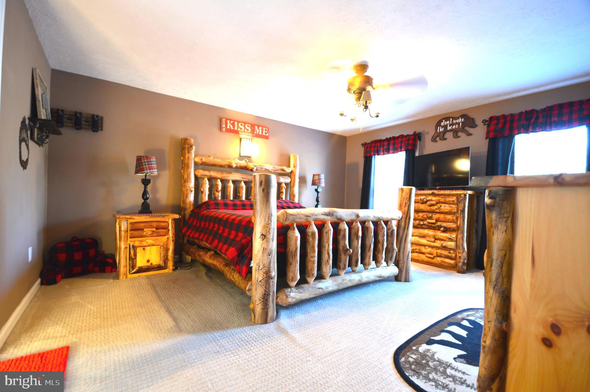 14 Minnie Ha-Ha Road Albrightsville, PA 18210 - Photo 20 of 34 a bedroom with furniture and a window