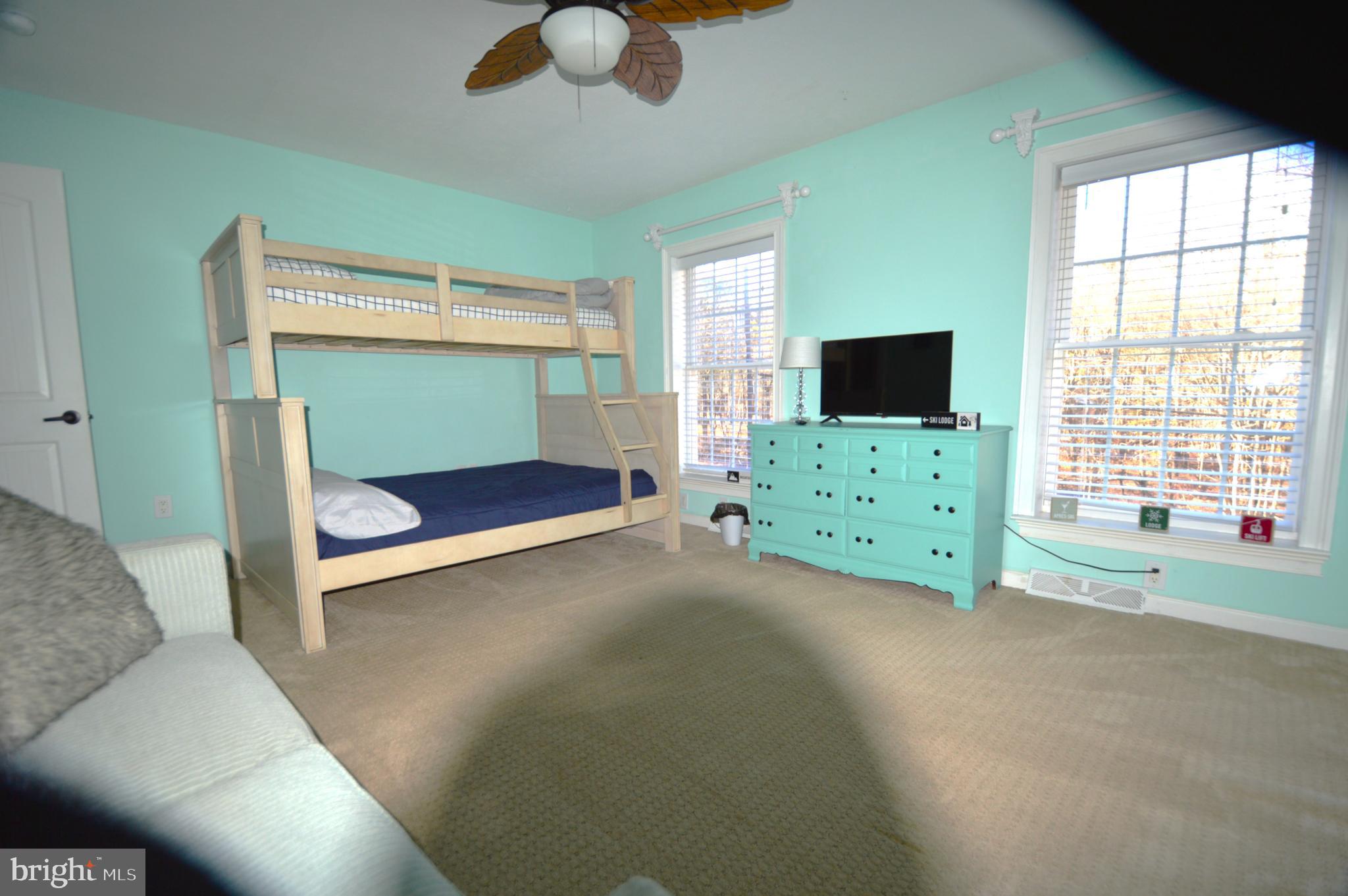 14 Minnie Ha-Ha Road Albrightsville, PA 18210 - Photo 26 of 34 a living room with furniture and a flat screen tv