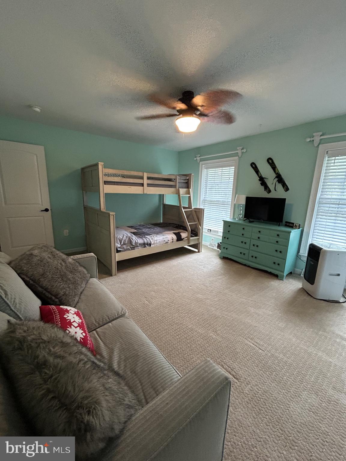 14 Minnie Ha-Ha Road Albrightsville, PA 18210 - Photo 27 of 34 a living room with furniture and a chandelier