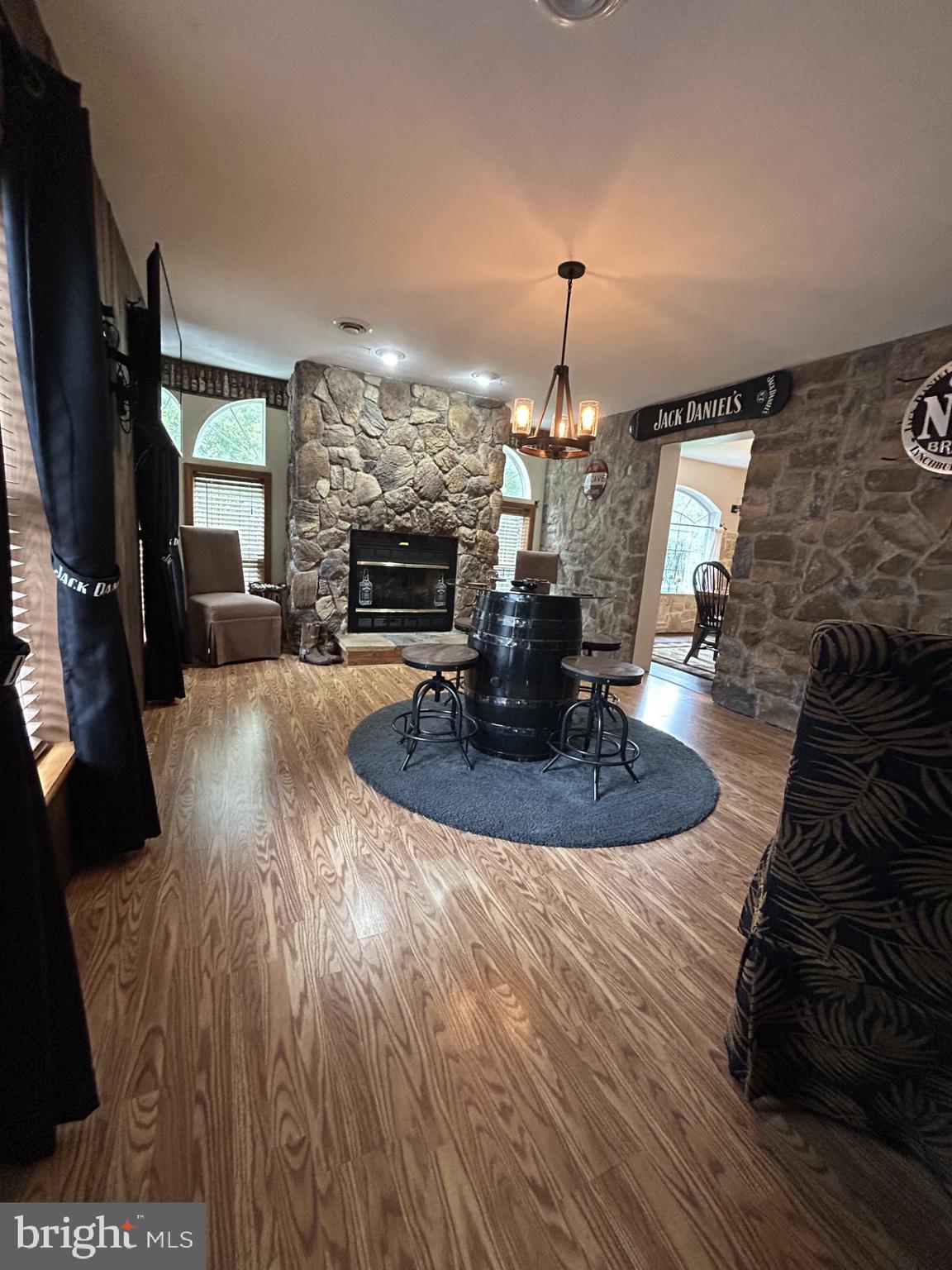 14 Minnie Ha-Ha Road Albrightsville, PA 18210 - Photo 9 of 34 a view of a living room a fireplace with wooden floor