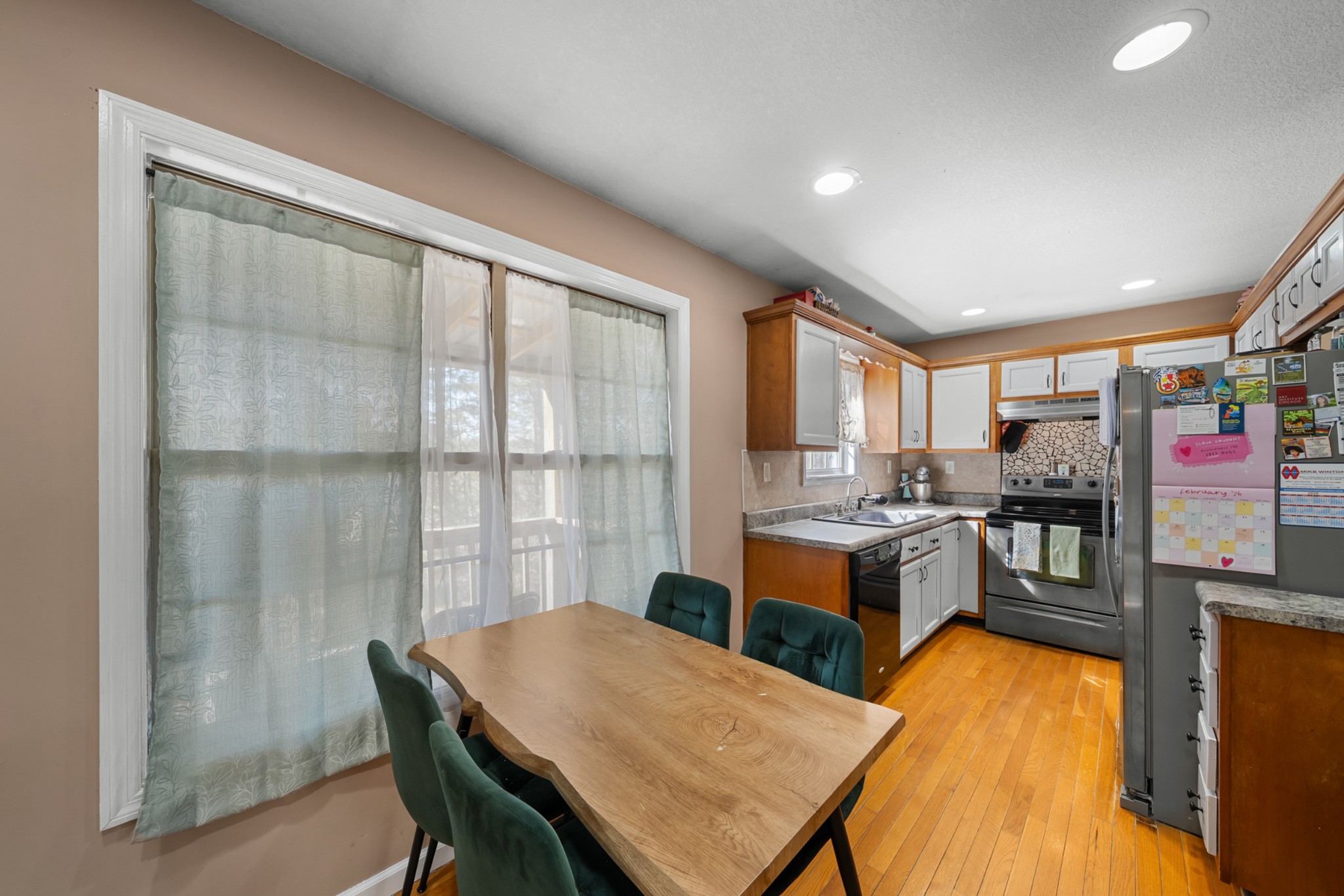124 Brown Lane Tracy City, TN 37387 - Photo 11 of 28 a view of a dining room with furniture window and outside view