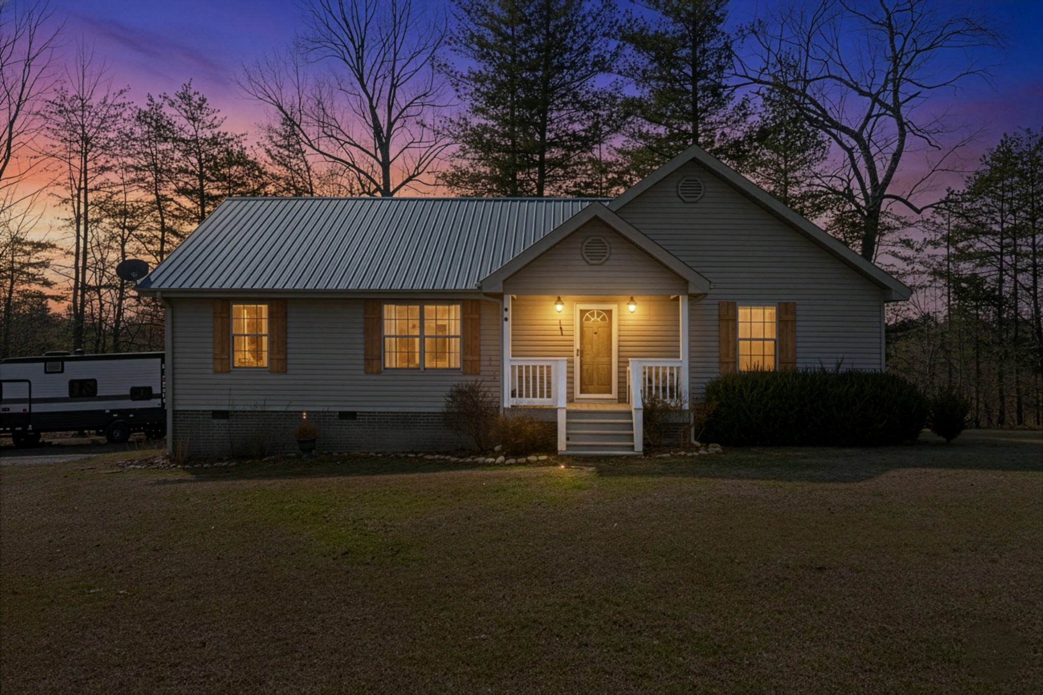 124 Brown Lane Tracy City, TN 37387 - Photo 28 of 28 a front view of a house with a yard