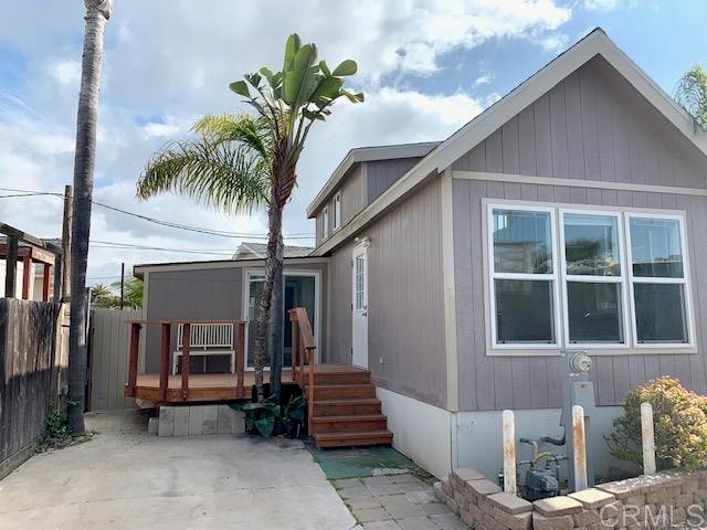 155 West Jason Street, Unit 16 Encinitas, CA 92024 - Photo 1 of 1 a front view of a house with outdoor seating