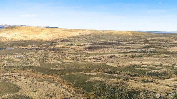 a view of ocean and mountains