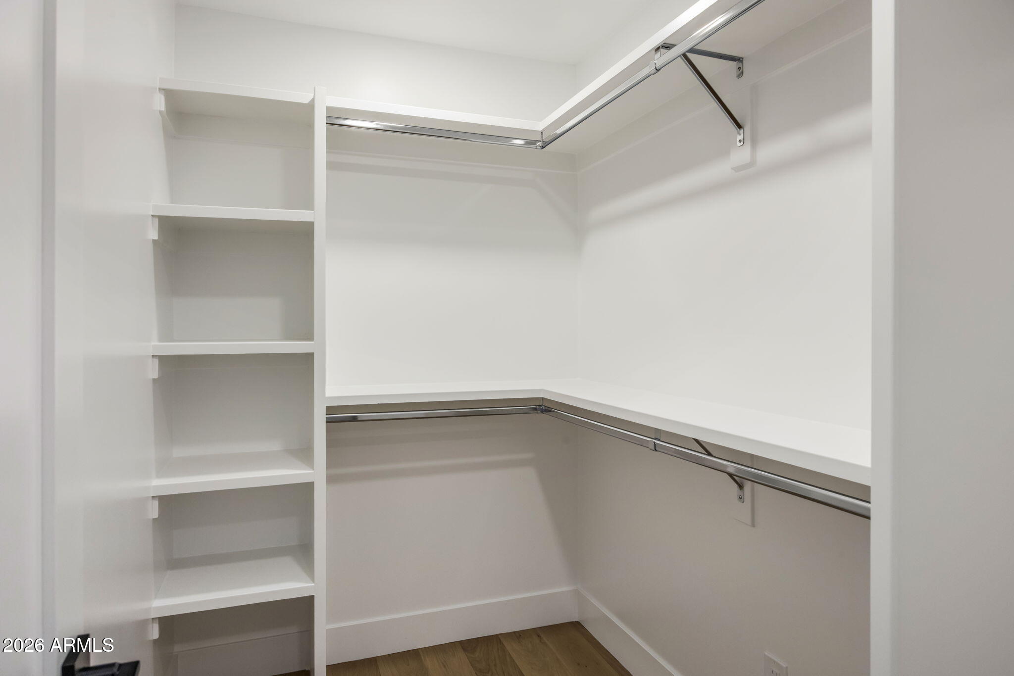 3023 North 49th Street Phoenix, AZ 85018 - Photo 16 of 32 a view of an empty walk in closet