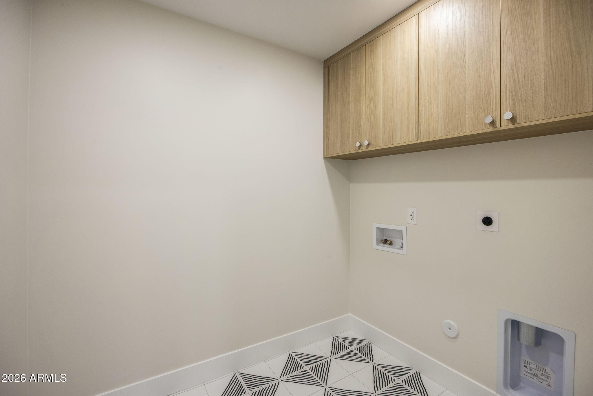 3023 North 49th Street Phoenix, AZ 85018 - Photo 24 of 32 a view of storage and utility room with window