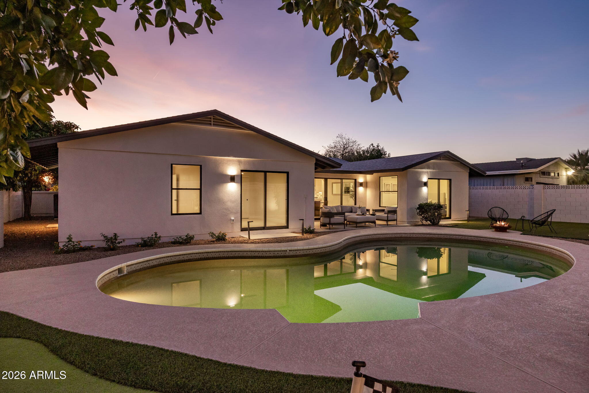 3023 North 49th Street Phoenix, AZ 85018 - Photo 32 of 32 a view of a swimming pool with seating space