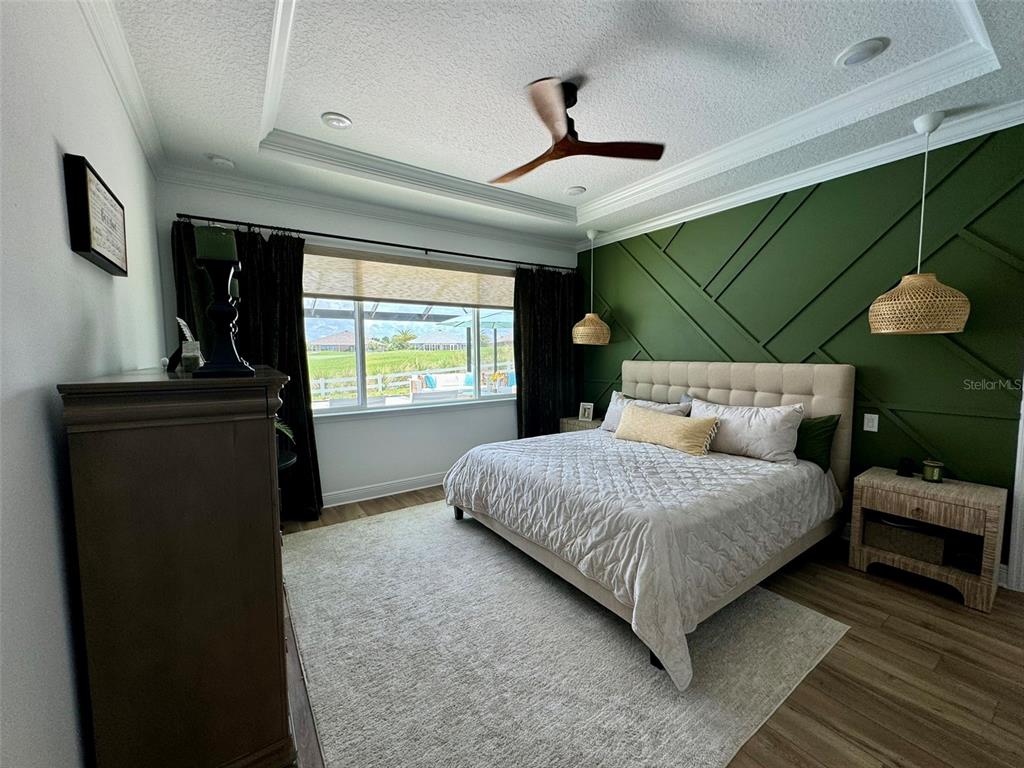 9232 Southwest 85th Place Ocala, FL 34481 - Photo 13 of 38 a bedroom with a bed and a window