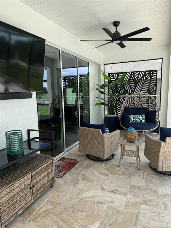 9232 Southwest 85th Place Ocala, FL 34481 - Photo 28 of 38 a outdoor space with the couches and a fireplace