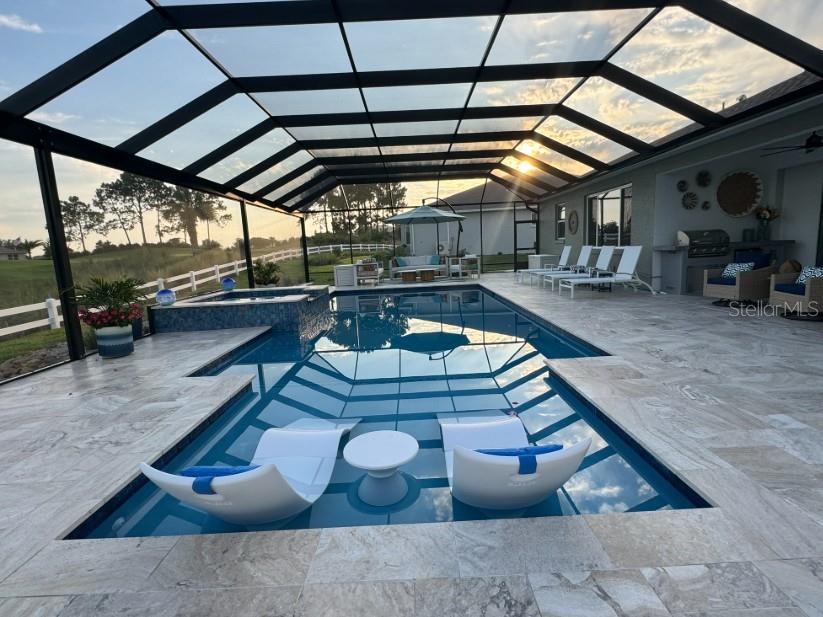 9232 Southwest 85th Place Ocala, FL 34481 - Photo 29 of 38 a view of swimming pool with outdoor seating
