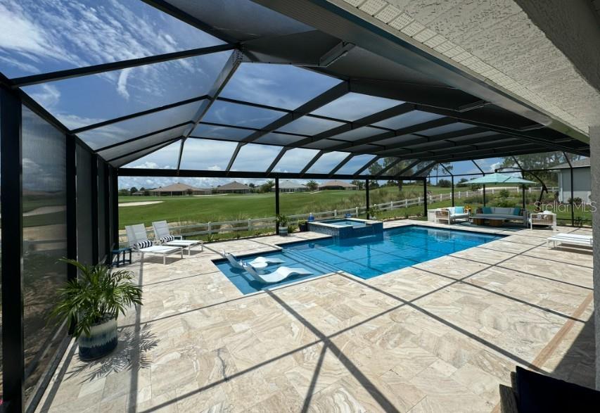 9232 Southwest 85th Place Ocala, FL 34481 - Photo 30 of 38 a view of a swimming pool with a patio