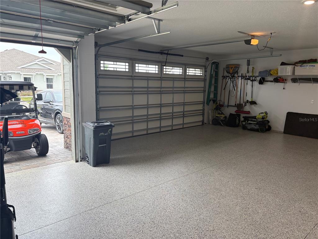 9232 Southwest 85th Place Ocala, FL 34481 - Photo 35 of 38 a view of a garage with storage