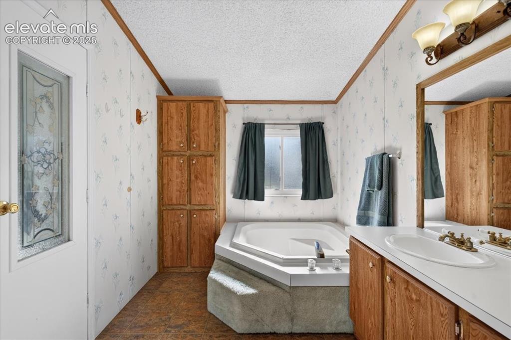 6210 Prospero Road Peyton, CO 80831 - Photo 9 of 26 En Suite Full Primary bath