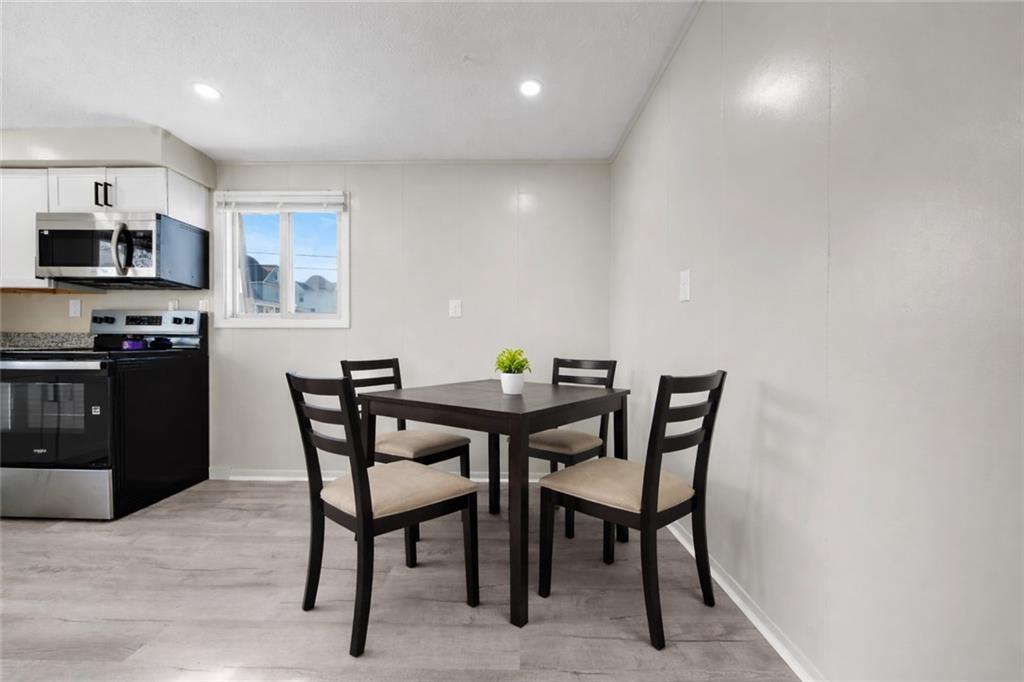 116 4th Street McDonald, PA 15057 - Photo 5 of 16 a view of a dining room with furniture