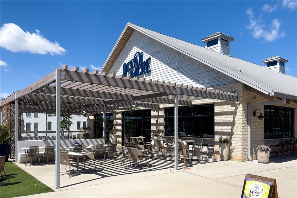715 Crown Cove Milton, GA 30004 - Photo 101 of 102 a view of a building with sitting area