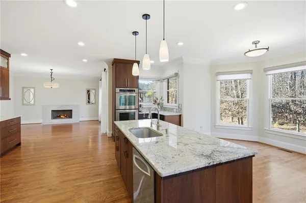 a bathroom with a toilet a sink and a shower curtain