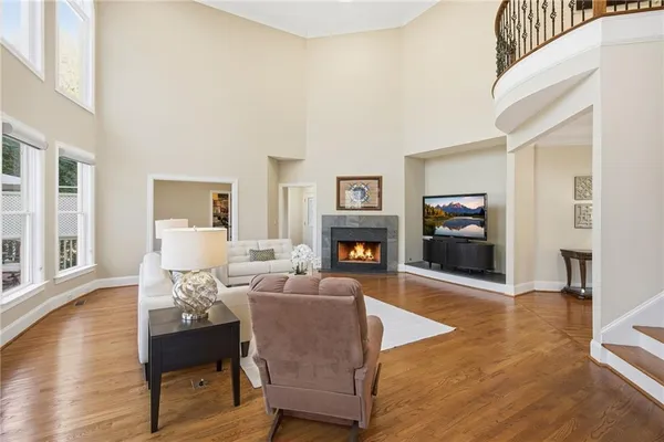 a bedroom with a bed and ceiling fan
