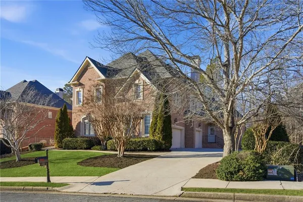 a view of entryway livingroom and hall with wooden floor