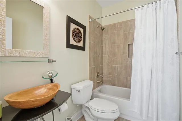 a front view of a house with outdoor space