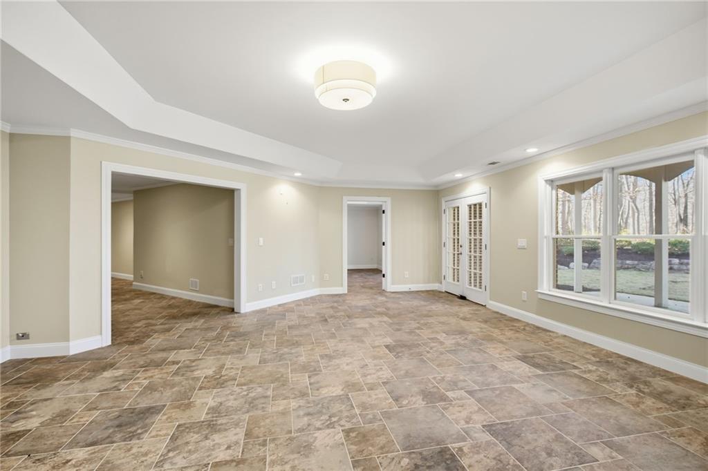 715 Crown Cove Milton, GA 30004 - Photo 46 of 102 a view of an empty room with a window