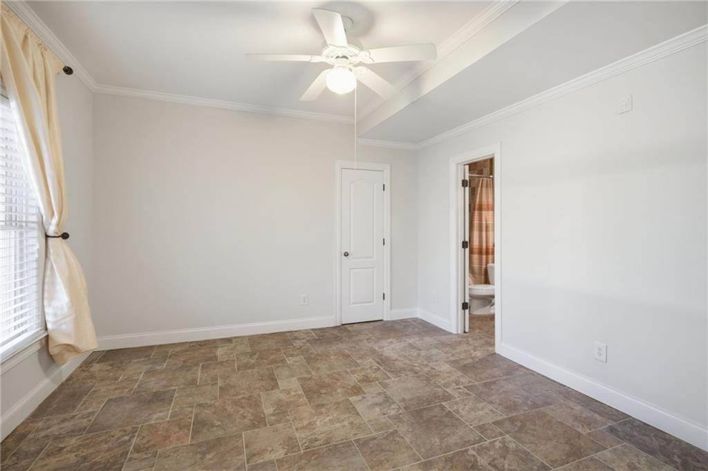 715 Crown Cove Milton, GA 30004 - Photo 47 of 102 wooden floor in an empty room with a window