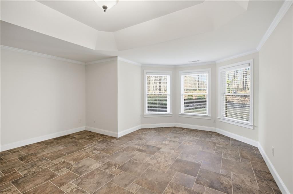 715 Crown Cove Milton, GA 30004 - Photo 49 of 102 a view of an empty room with a window