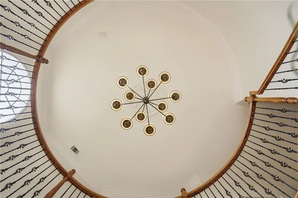 a large kitchen with stainless steel appliances kitchen island granite countertop a large counter top stainless steel appliances and cabinets