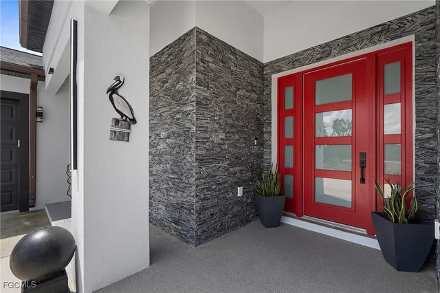 a view of entryway with stairs and wooden floor