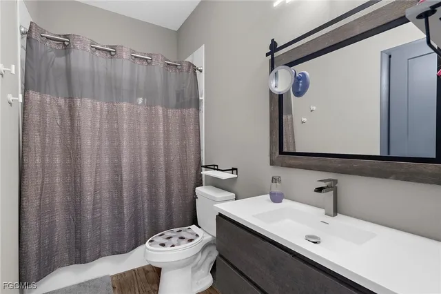 a view of an empty room and a window