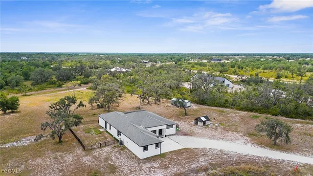 a view of a city with lawn chairs