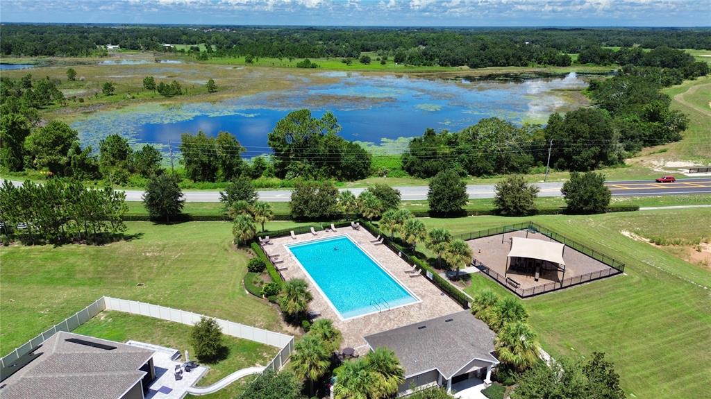 207 Petosky Road Groveland, FL 34736 - Photo 21 of 21 an aerial view of a house with garden view and lake view